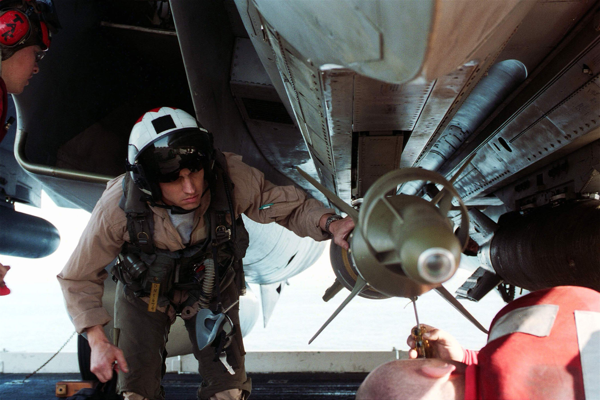 011020 N-6626D 006 Checking Weapons Pre Flight