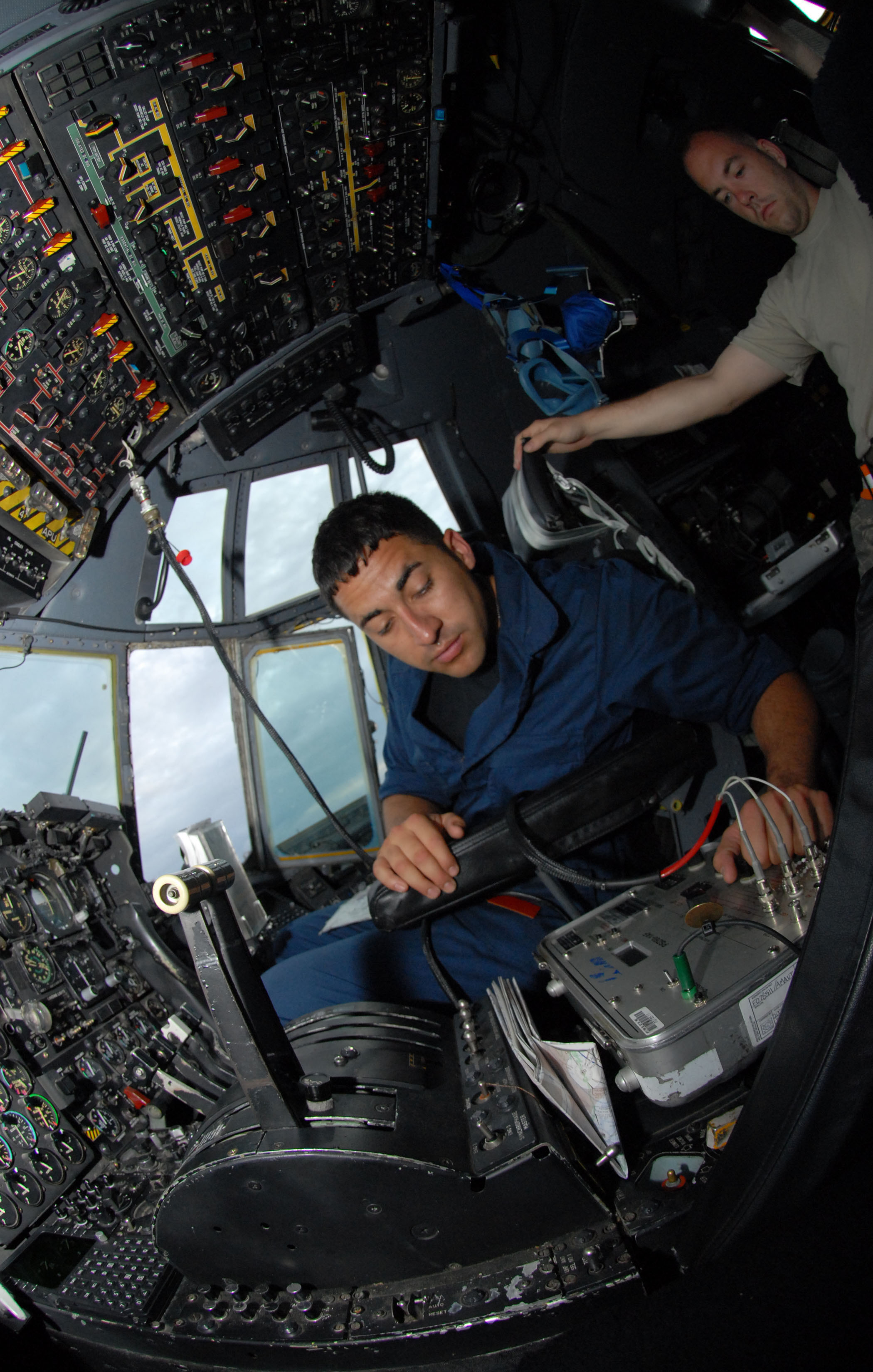 080516 F-0561K 024 checks on C-130 cockpit