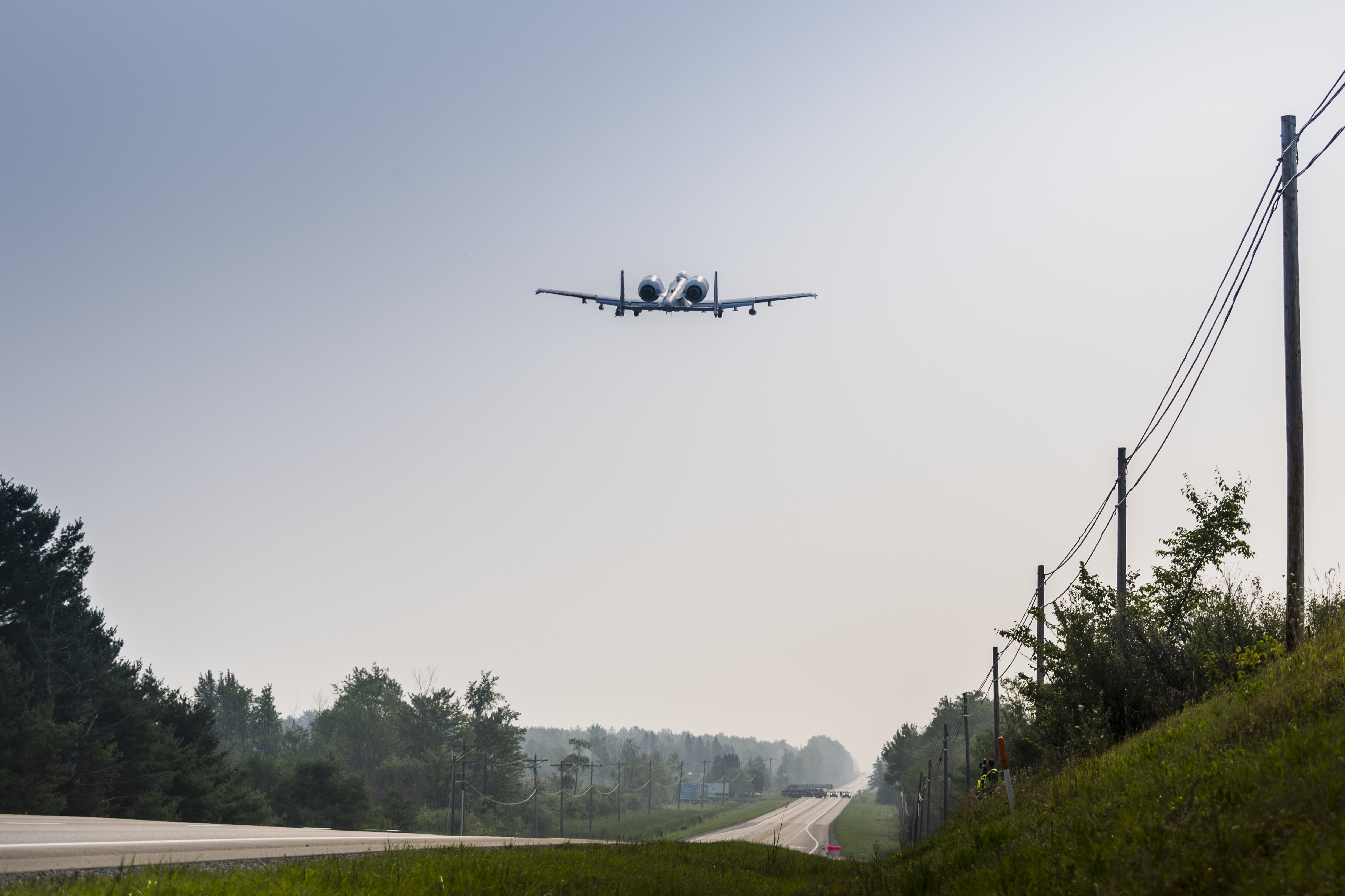 A-10 Thunderbolt II landing on a stretch of Michigan highway during an exercise