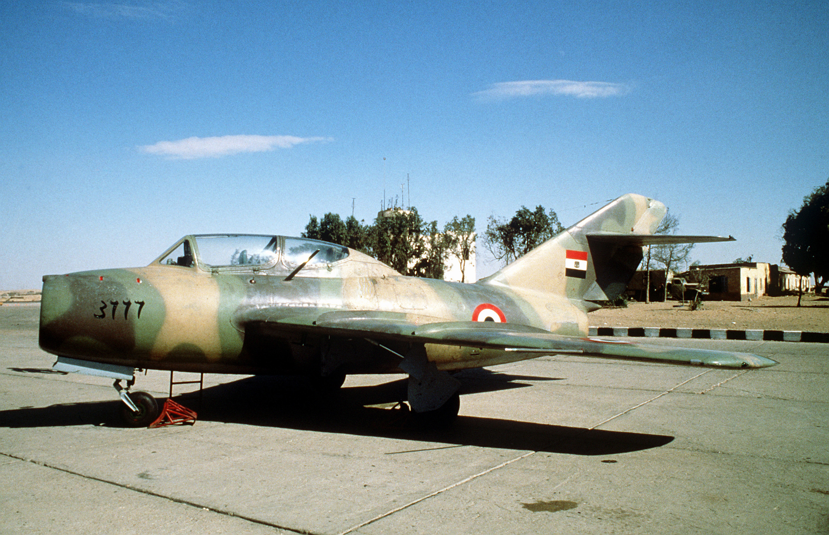 A right front view of an Egyptian (Soviet built) Mi G-15 aircraft parked on a flight line DF ST-85-03638