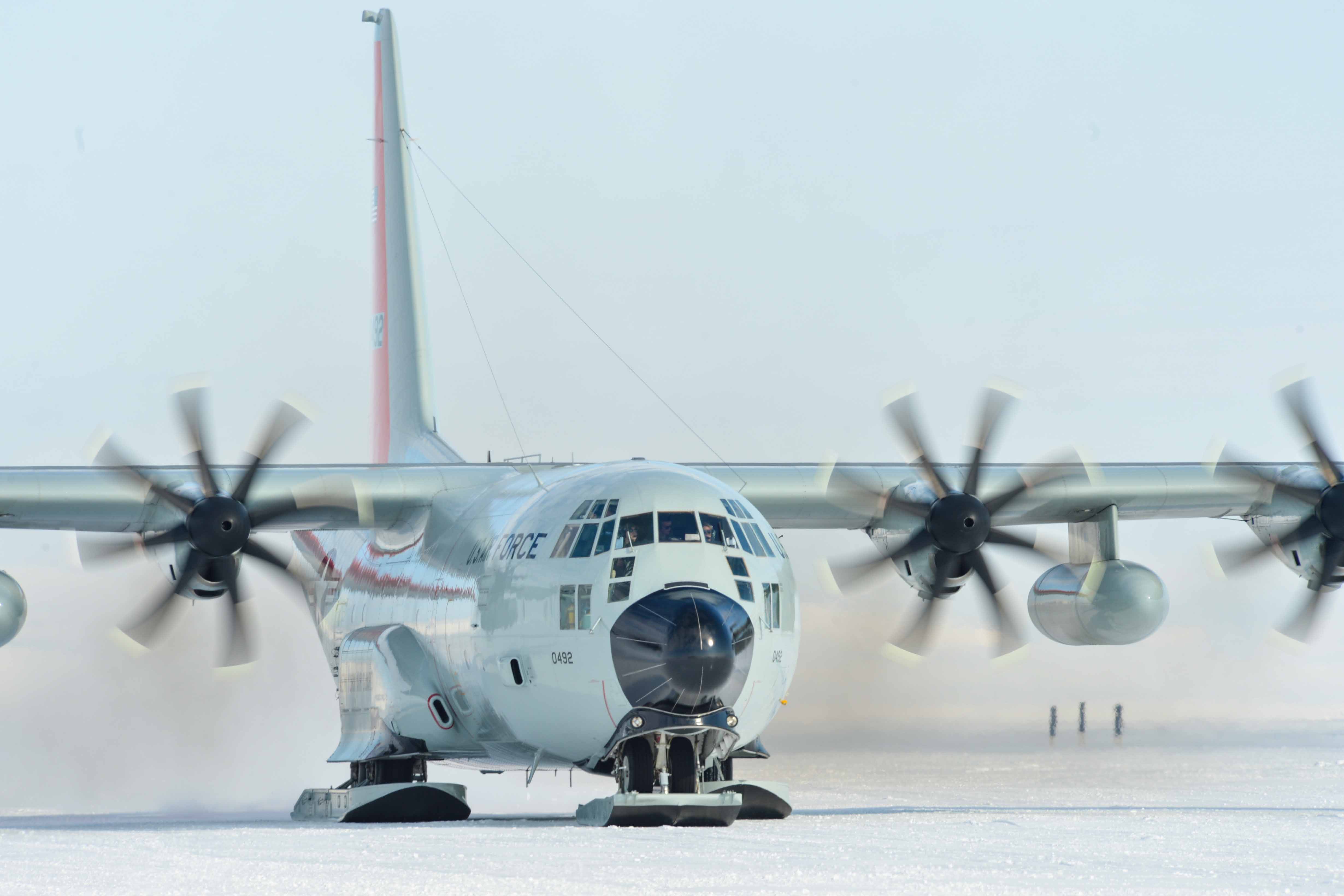 A ski equipped Hercules aircraft taxis along a compacted snow ice runway at Mc Murdo Station, Antarctica, Feb. 4, 2023
