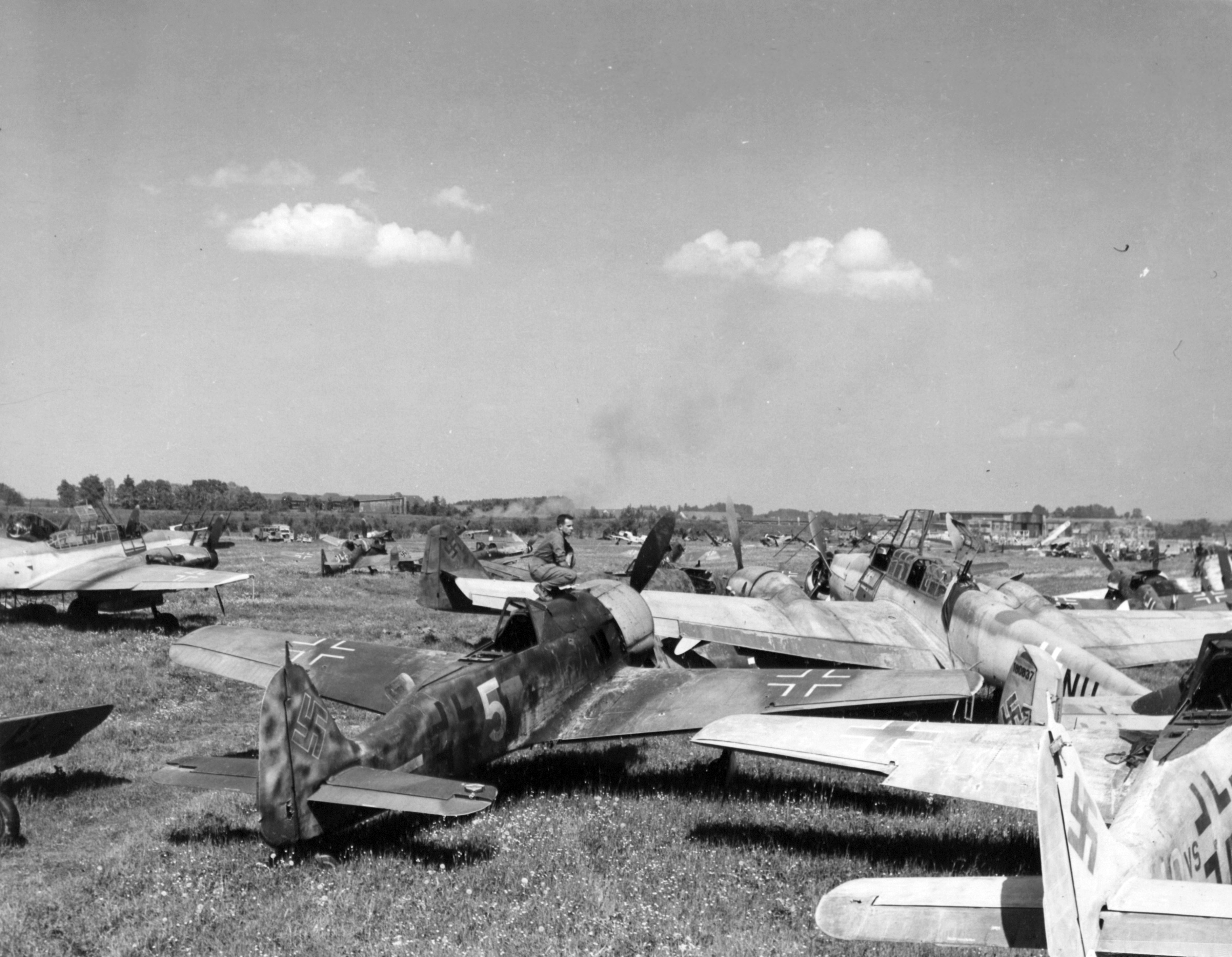 Abandoned German aircraft at Bad Aibling airfield, Germany, in May 1945 (342 FH-3A20774 A57932AC)