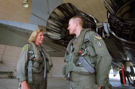 Air Force pilots Ken and Katie Ekman, first brother and sister fighter pilots to meet in a mock dogfight Aug 1999