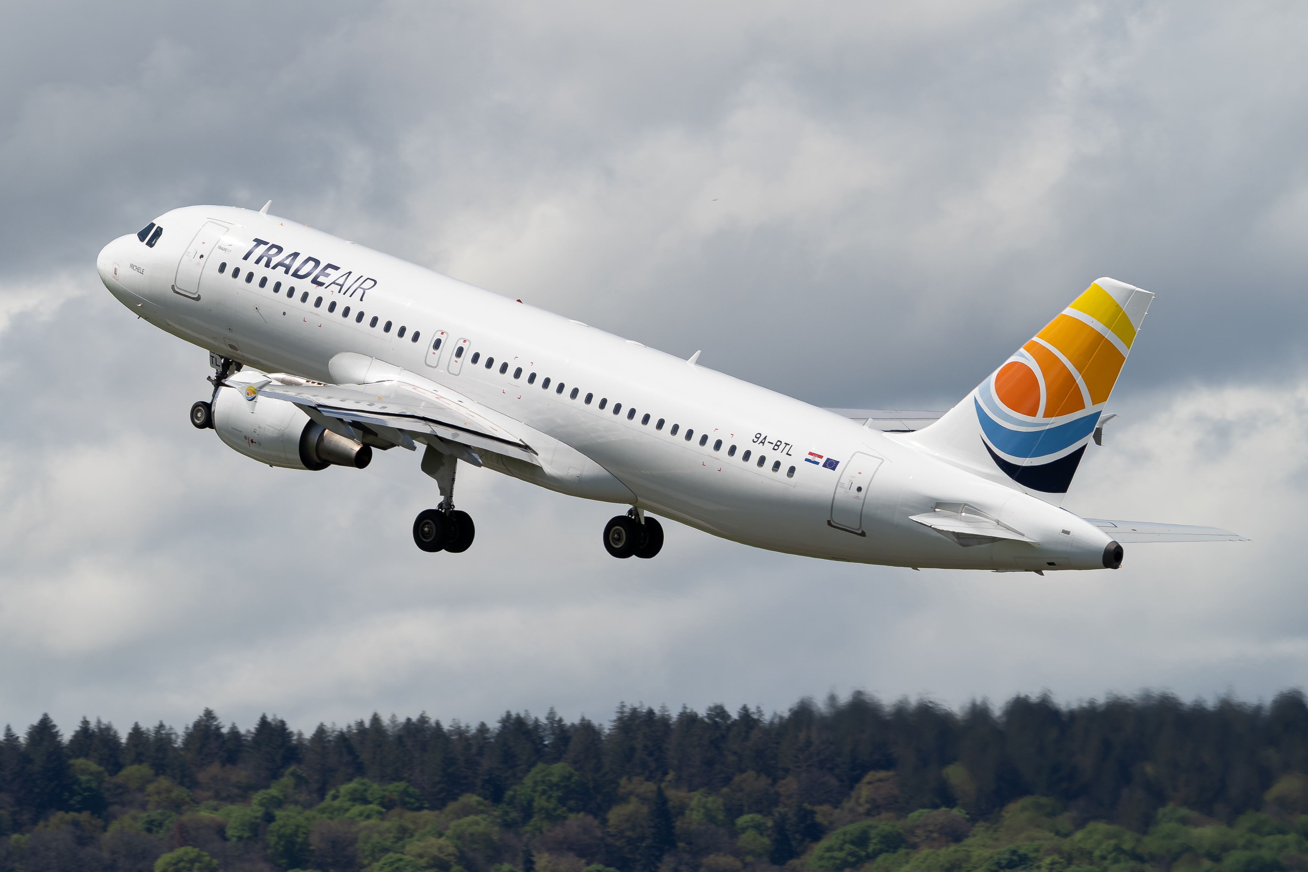 Airbus A320 - 9A BTL from Trade Air during take off at LFBT airport