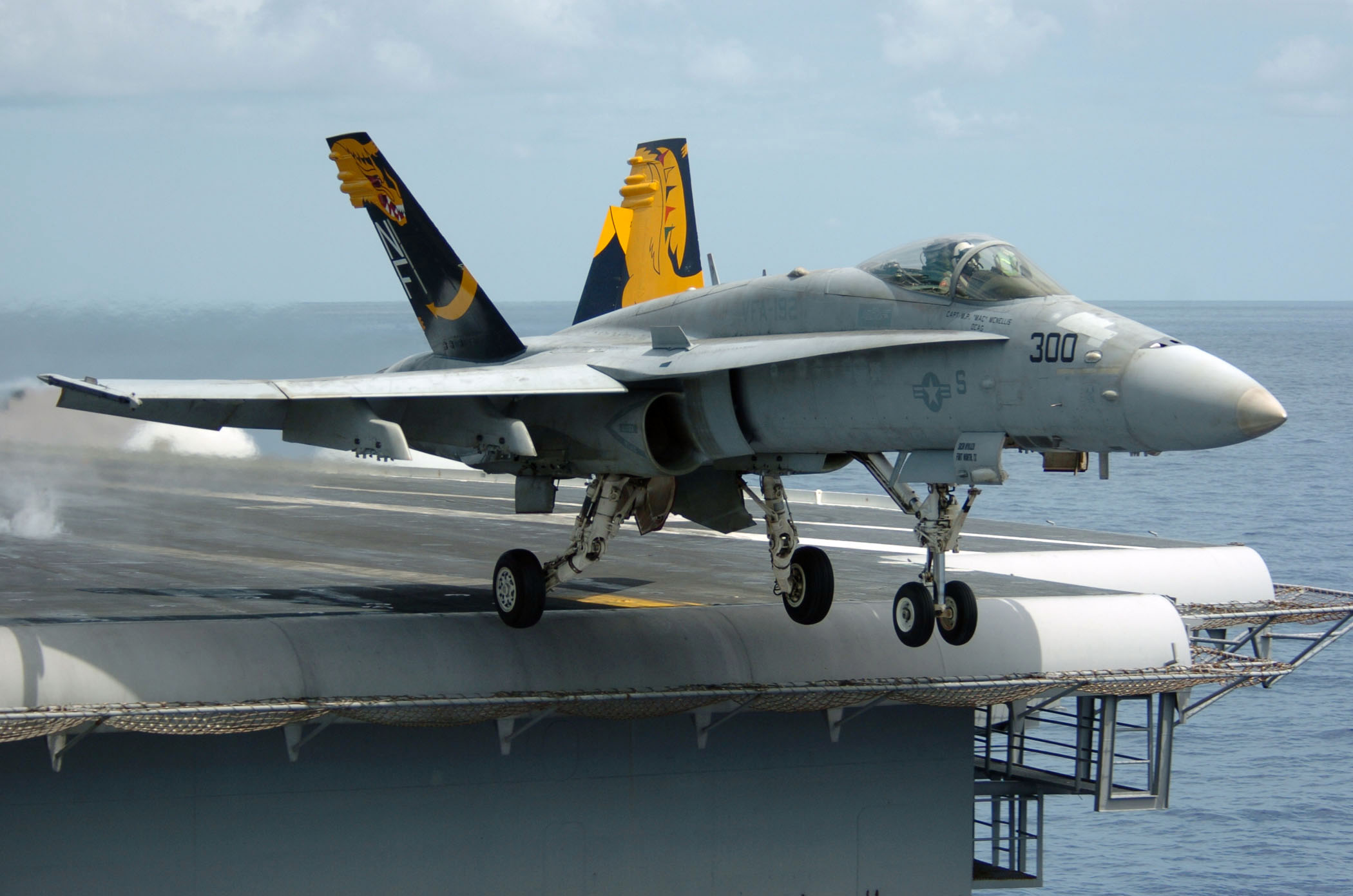 An F A-18C Hornet launches from the flight deck of the conventionally powered aircraft carrier