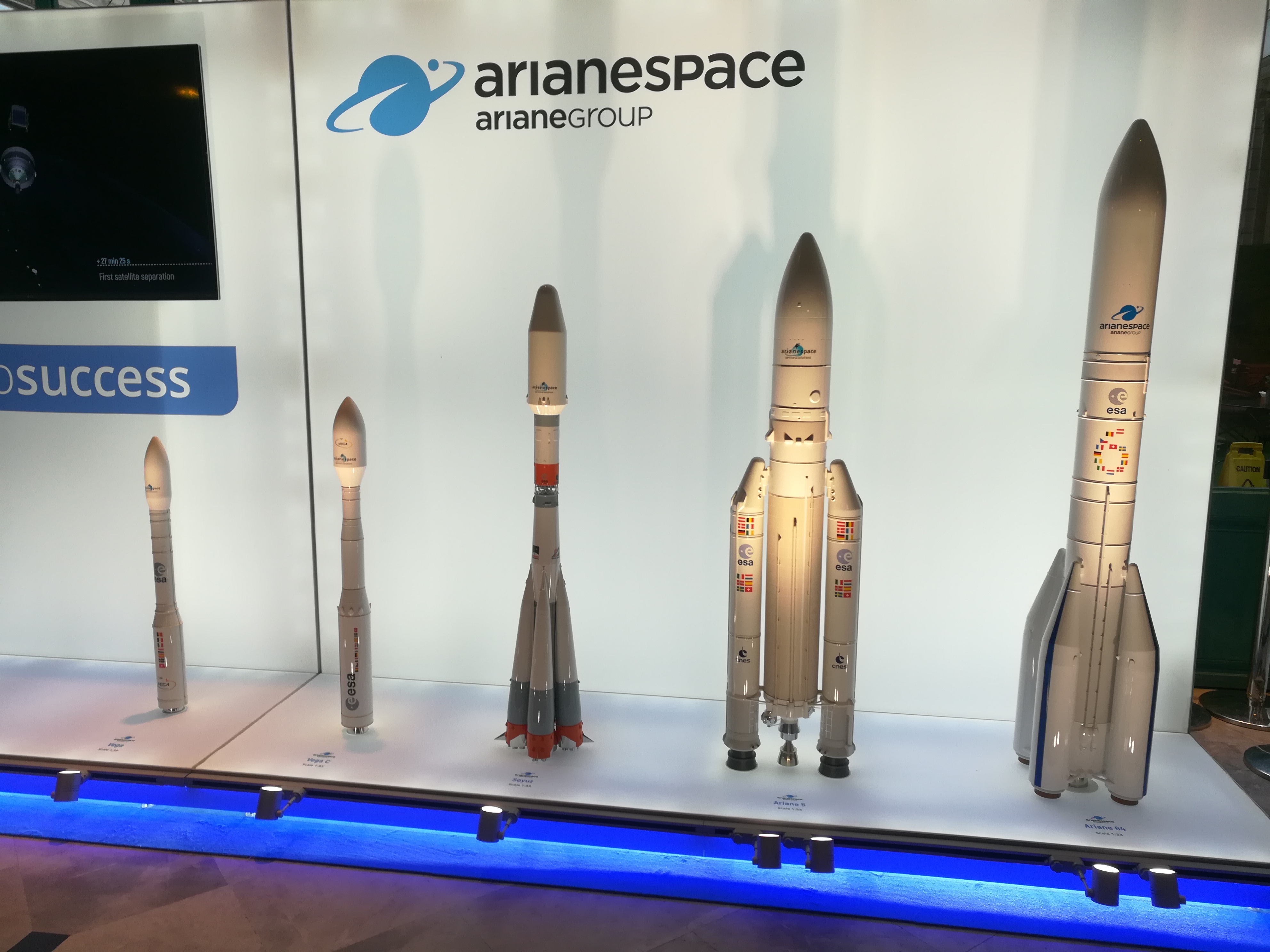 Arianespace mock-ups of the Soyuz-2 and Ariane launch vehicles