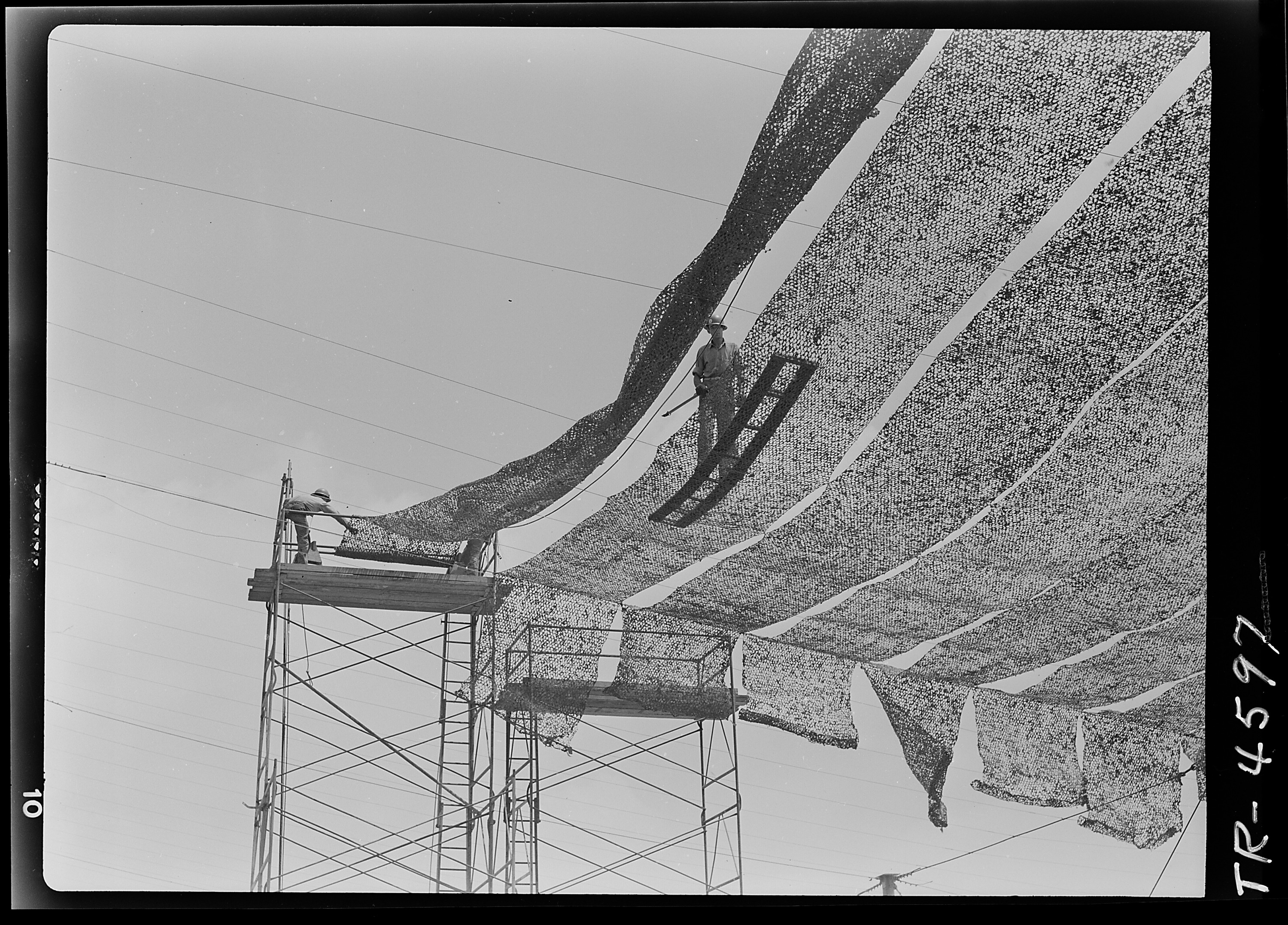 Camouflage netting at Consolidated Vultee aircraft plant, San Diego, Cal. - NARA