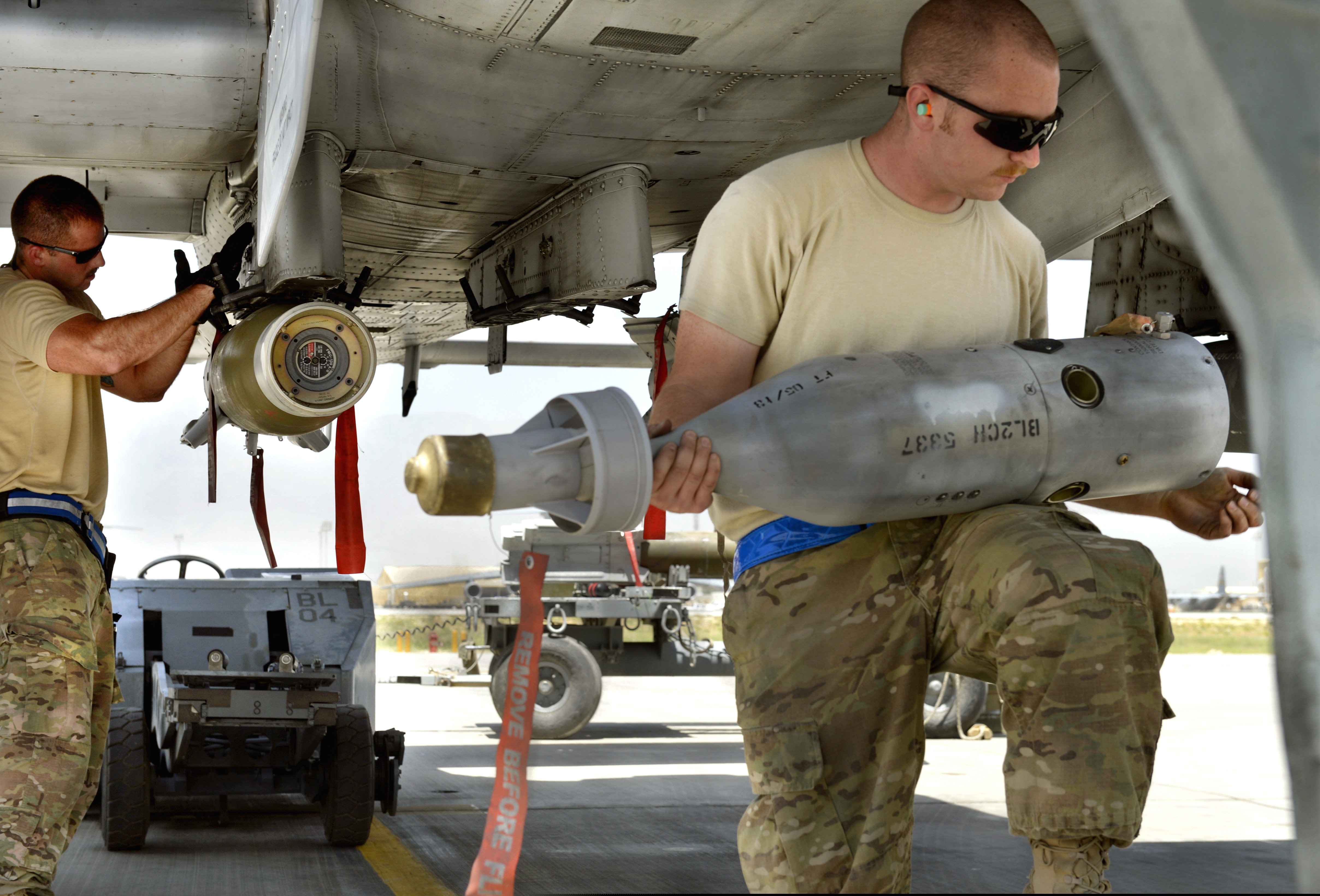 Weapons load crew loads precision-guided munitions onto an A-10C Thunderbolt II, Bagram