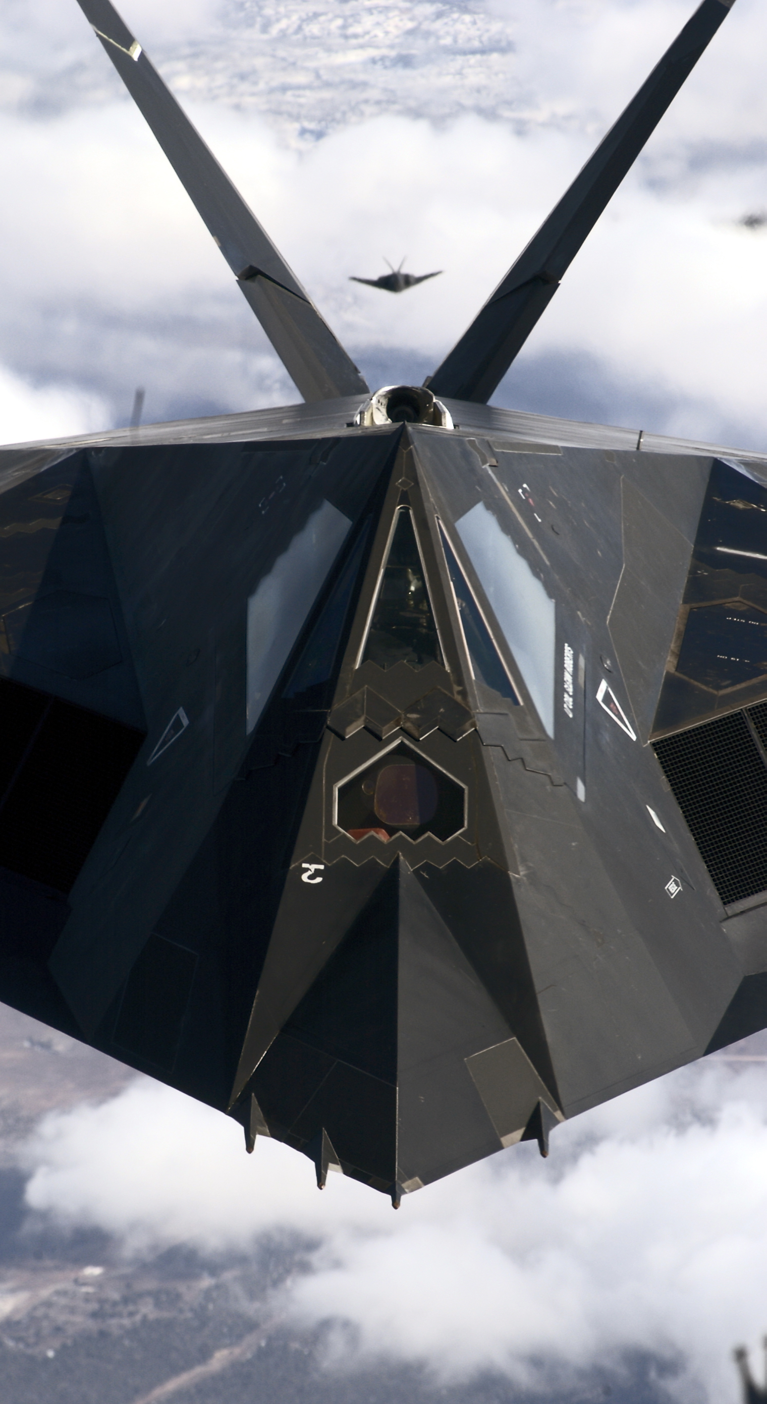F-117A Nighthawks flying in formation
