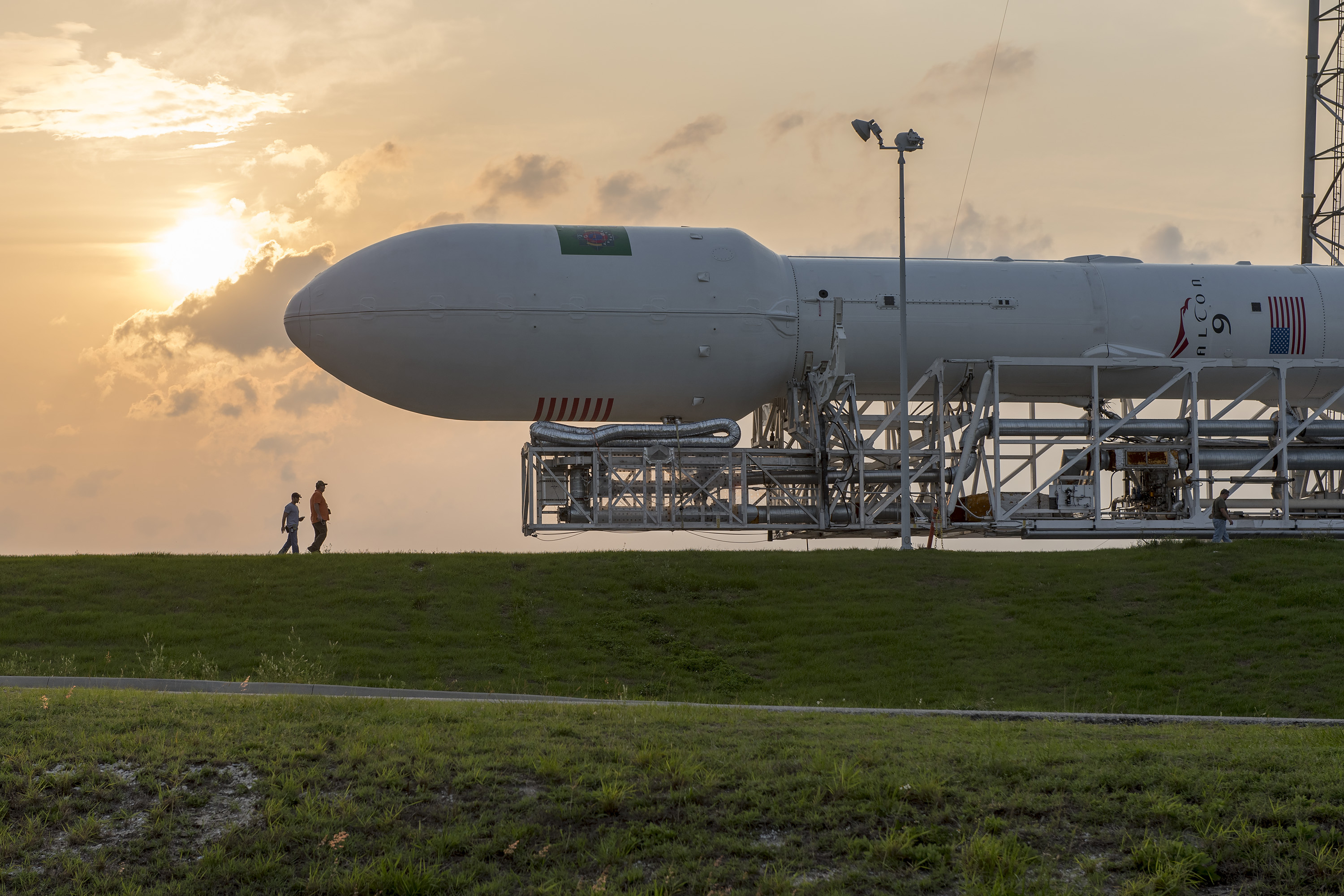 Falcon 9 rollout with TurkmenAlem52E-MonacoSAT to SLC-40