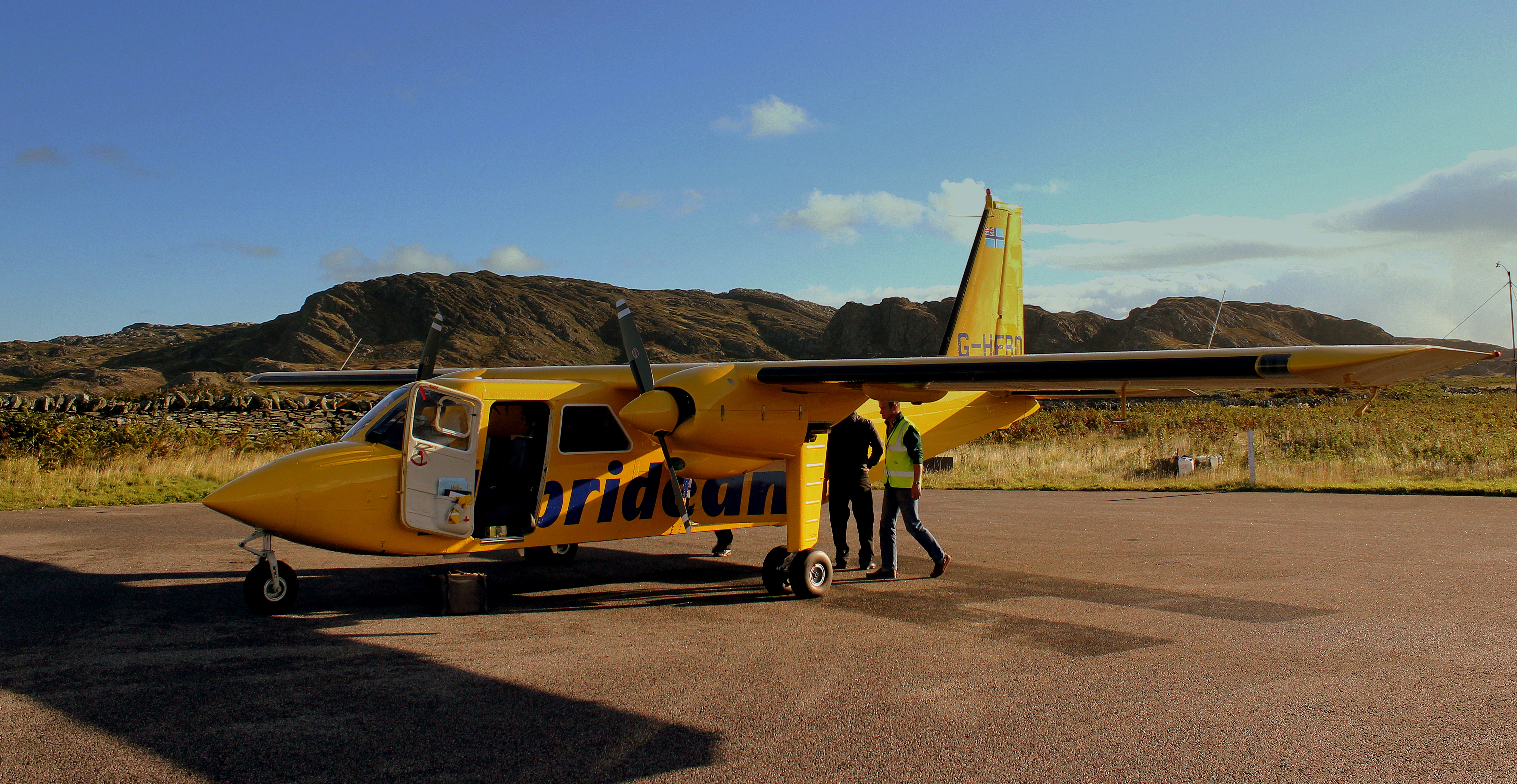 Hebridean Air Services BN2B ISLANDER G HEBO AT CONALSAY OPERATING FLIGHT 301 ABOUT TO DEPART FOR ISLAY SEP 2013