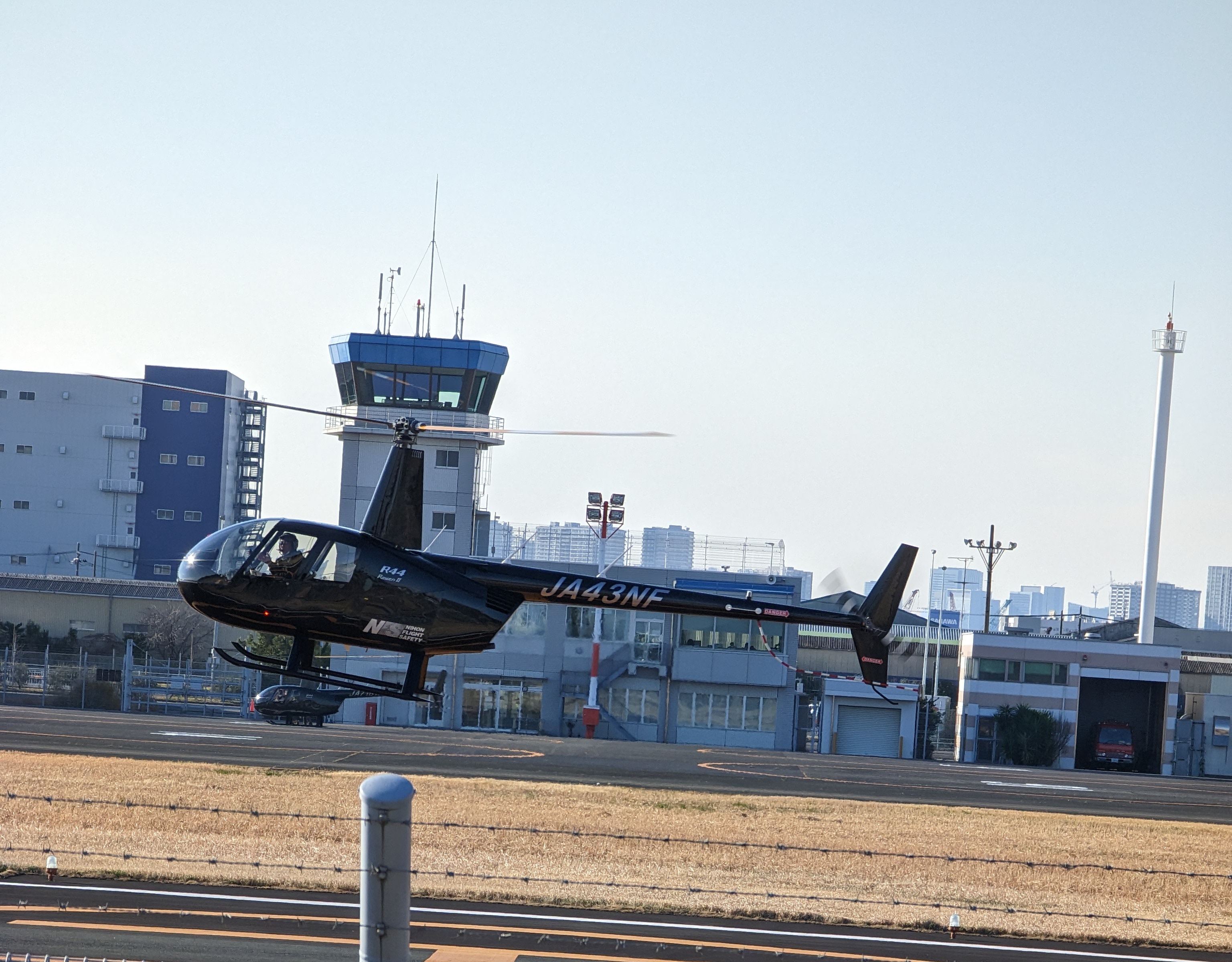 JA43NF R44 Raven II tourism helicopter at Tokyo Heliport