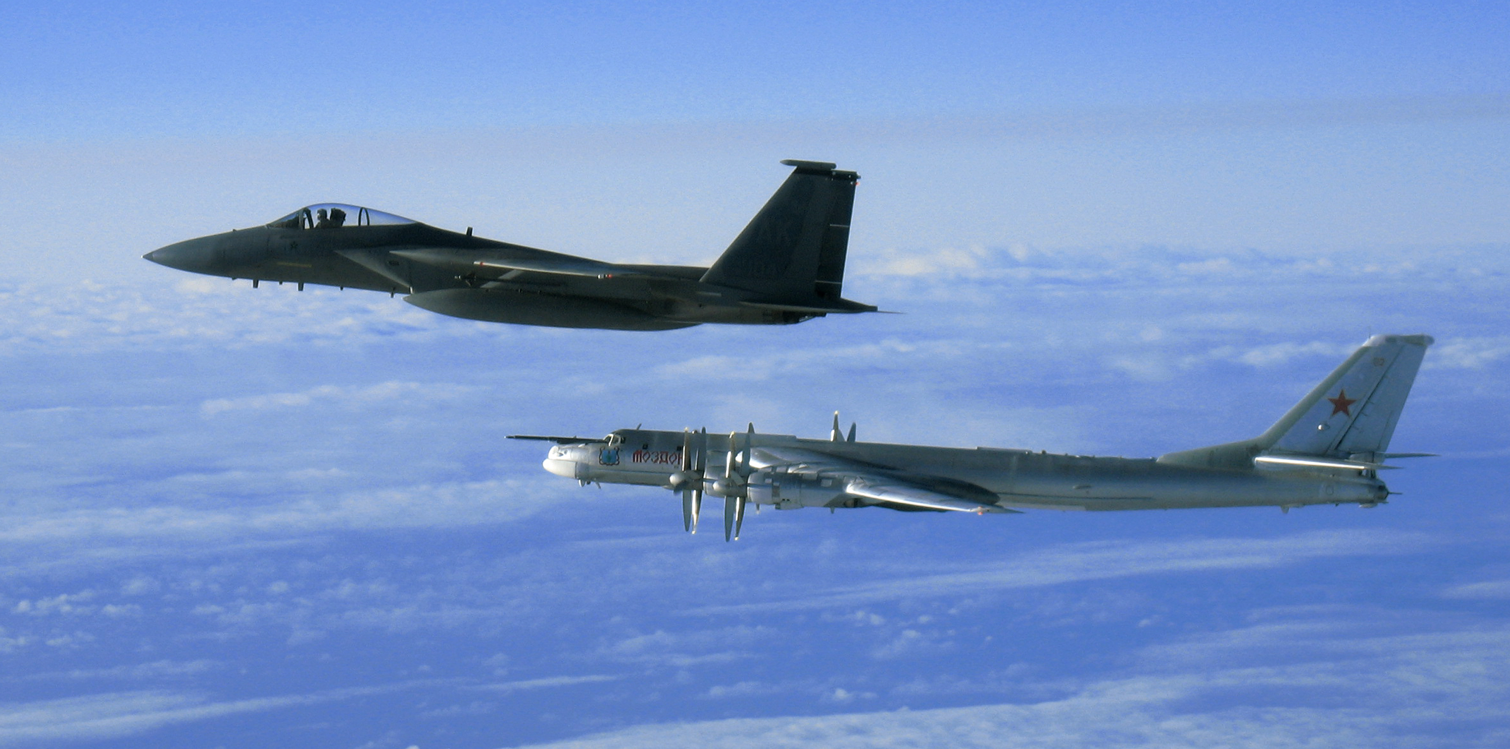 Mc Donnell Douglas F-15C Eagle of the 12th FS escorts a Russian Tupolev Tu-95MS off Alaska (USA), 28 September 2006 (0609