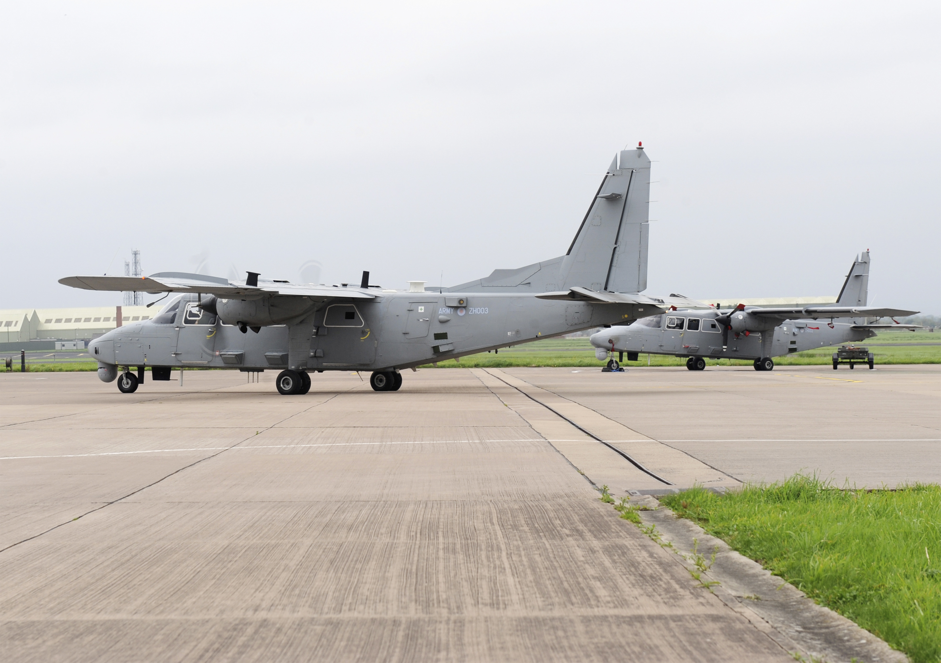 Pair of Britten Norman Defender 4000 aircraft of the Army Air Corps on the taxiway at Aldergrove