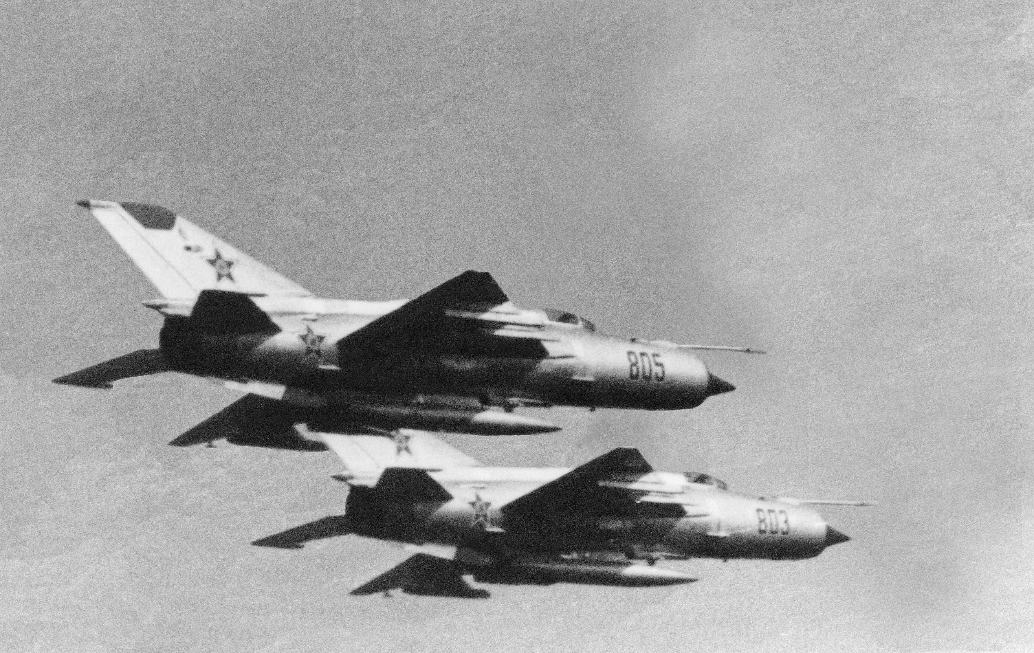 Pair of Soviet MiG-21s in flight, view from below