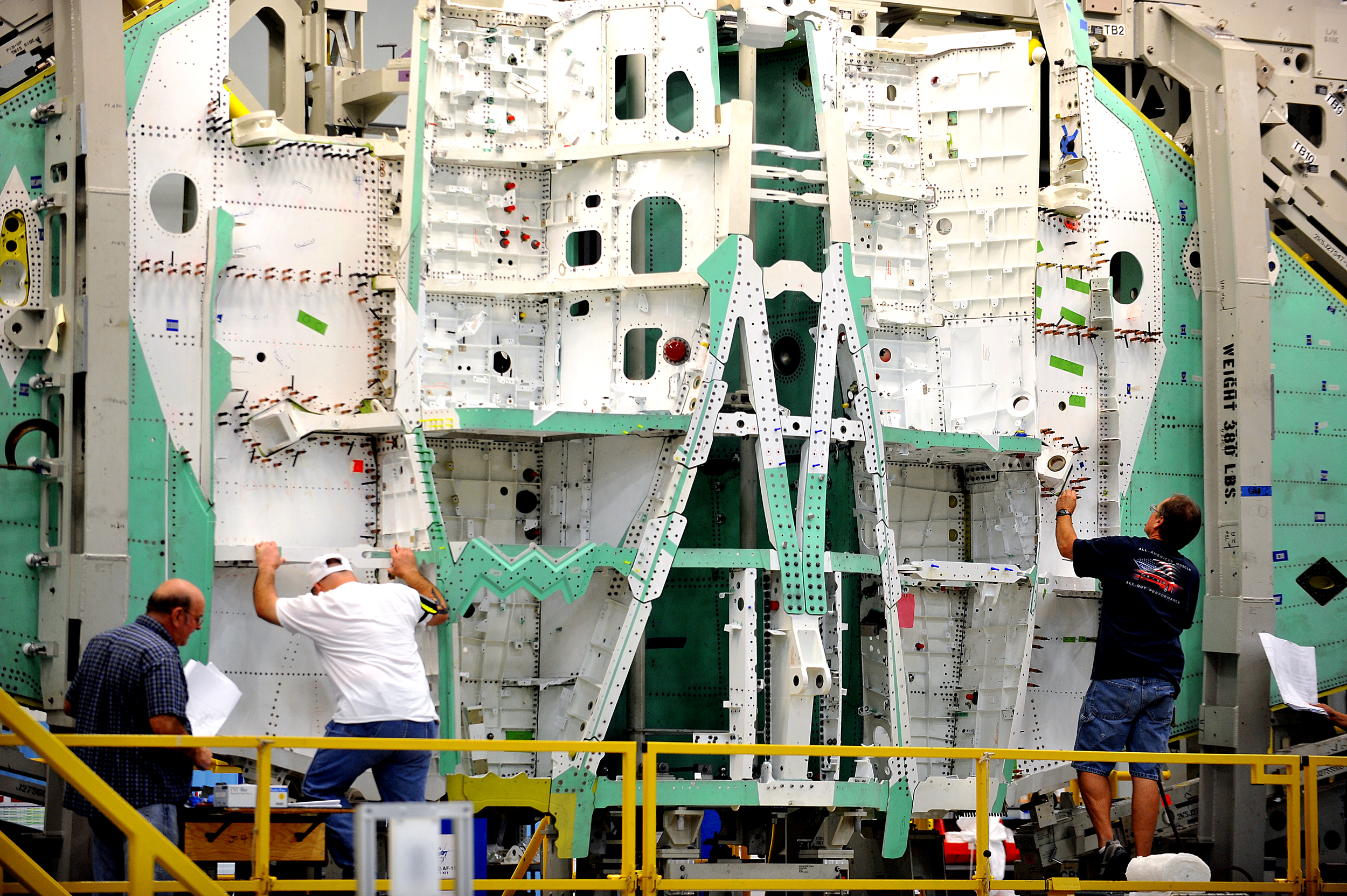 Plant workers work on the F-35 Joint Strike Fighter