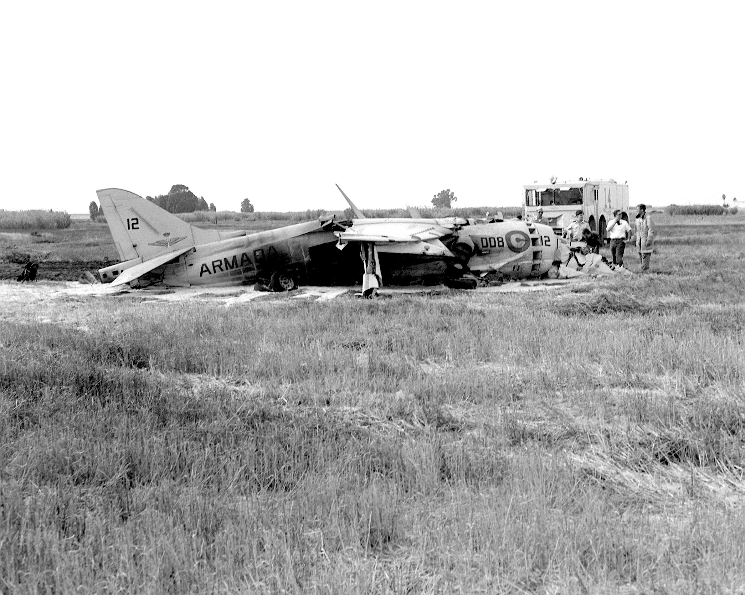 Salvage workers inspect the wreckage of a Spanish AV-8 Harrier aircraft after its crash - DPLA - 747 bce28dd78061373d1bd31664c305f