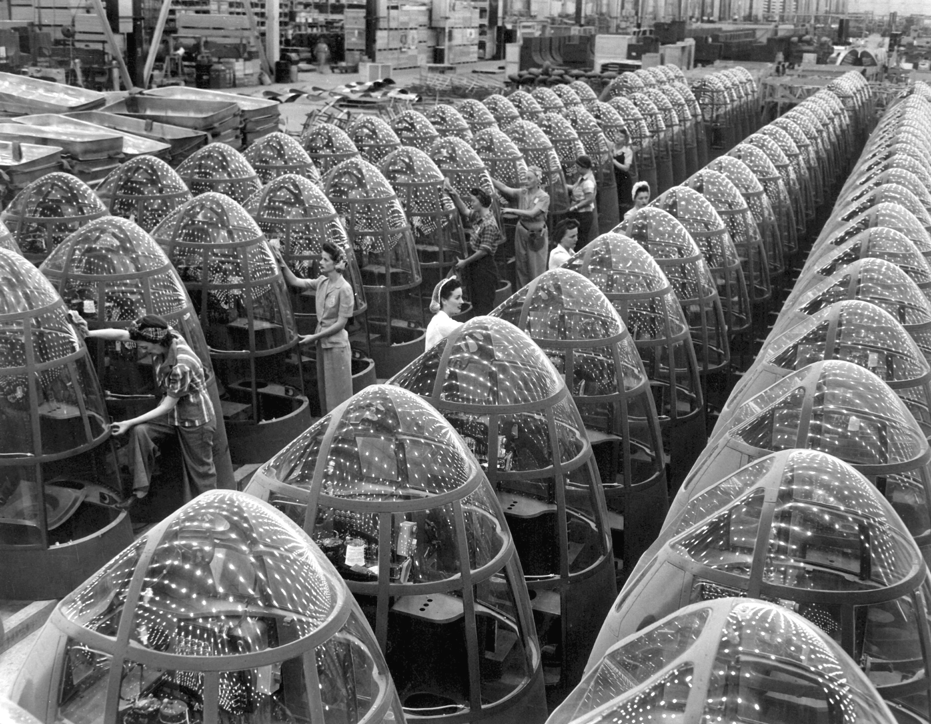Stars over Berlin and Tokyo will soon replace these factory lights reflected in the noses of planes at Douglas Aircraft's Long Beach, Calif., plant HD-SN-99-02461
