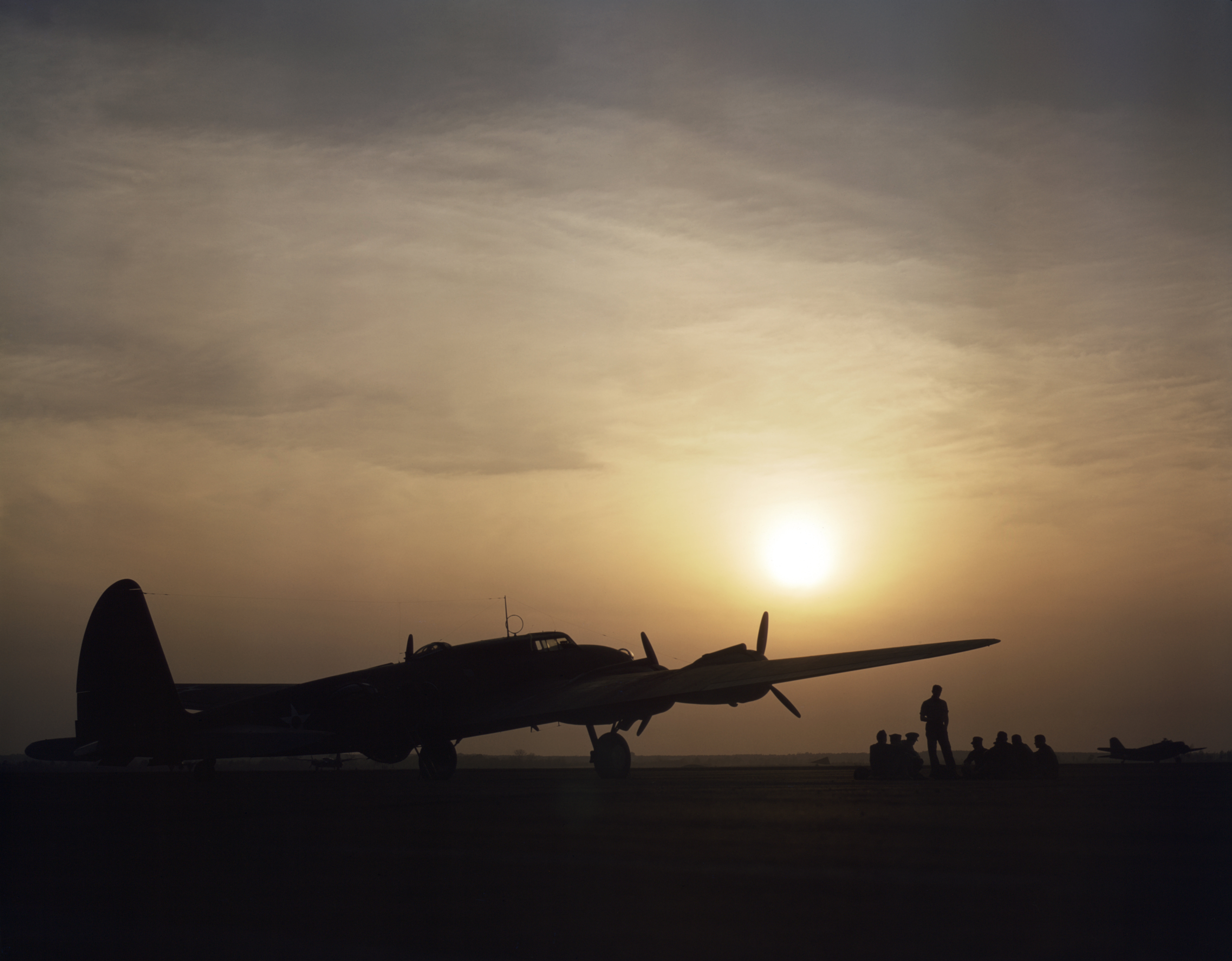 Sunset silhouette of flying fortress, Langley Field, Va