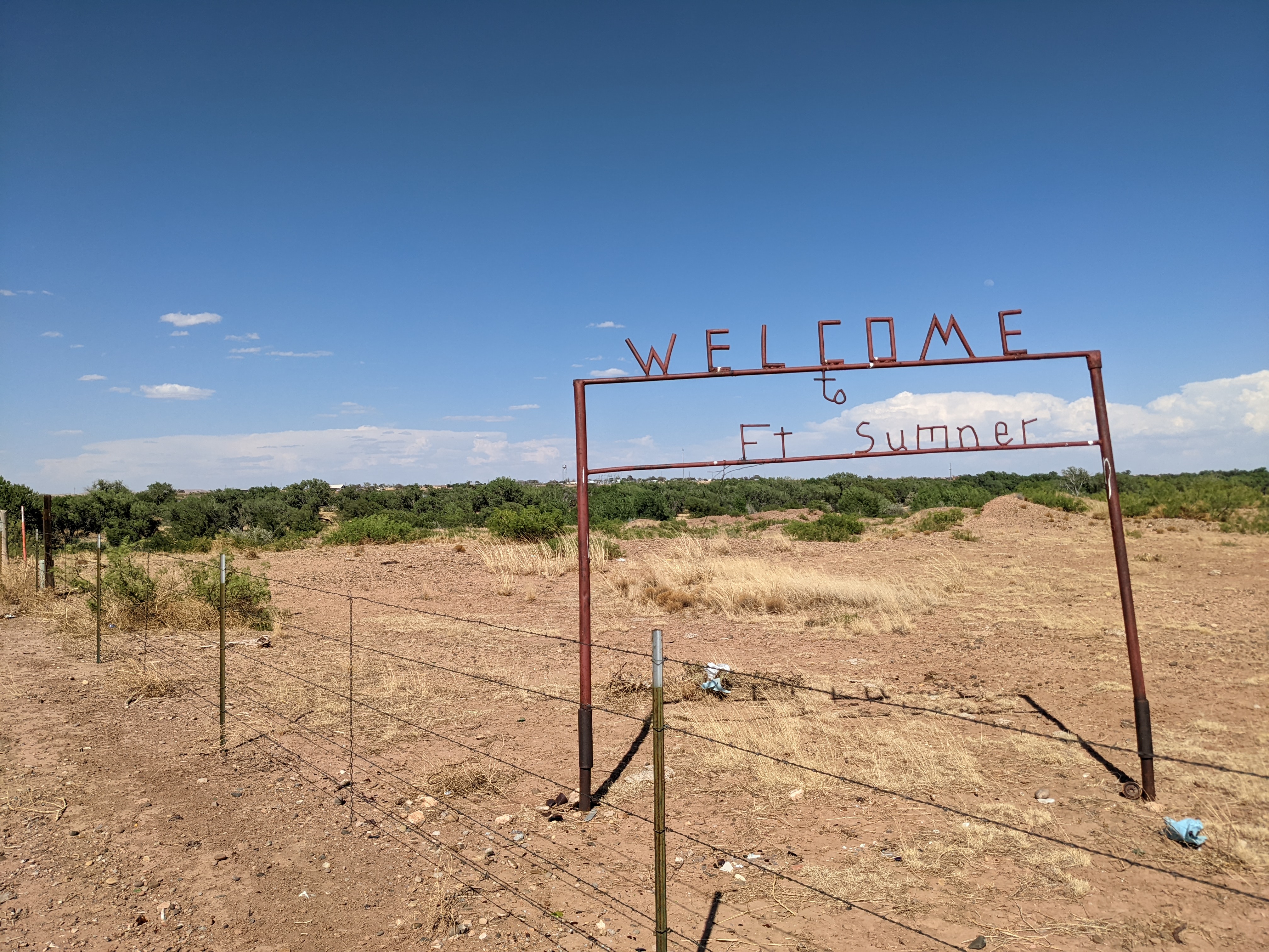 The Welcome to Fort Sumner sign near the junction of New Mexico Route 60 and Route 20 as seen on 11 May 2022
