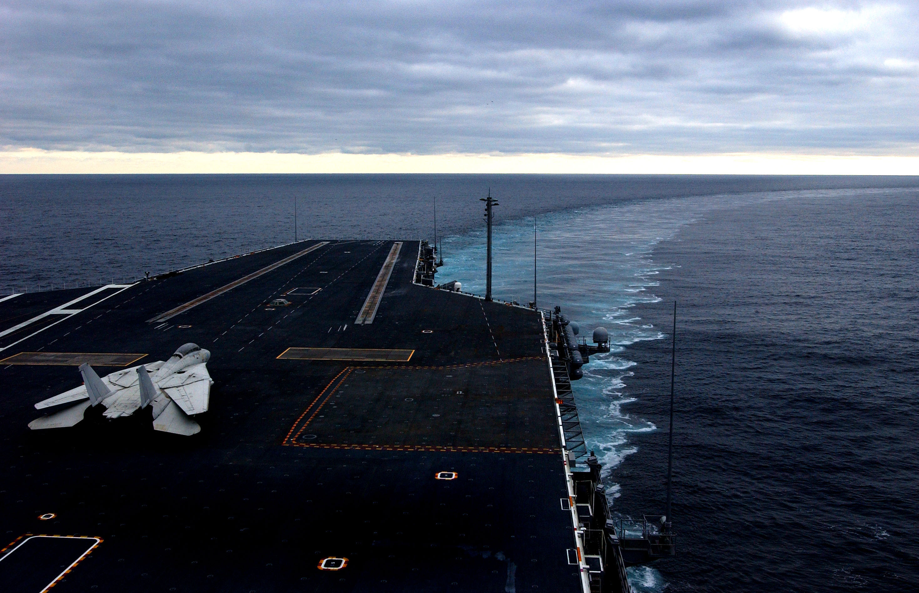 Why do aircraft carriers float?