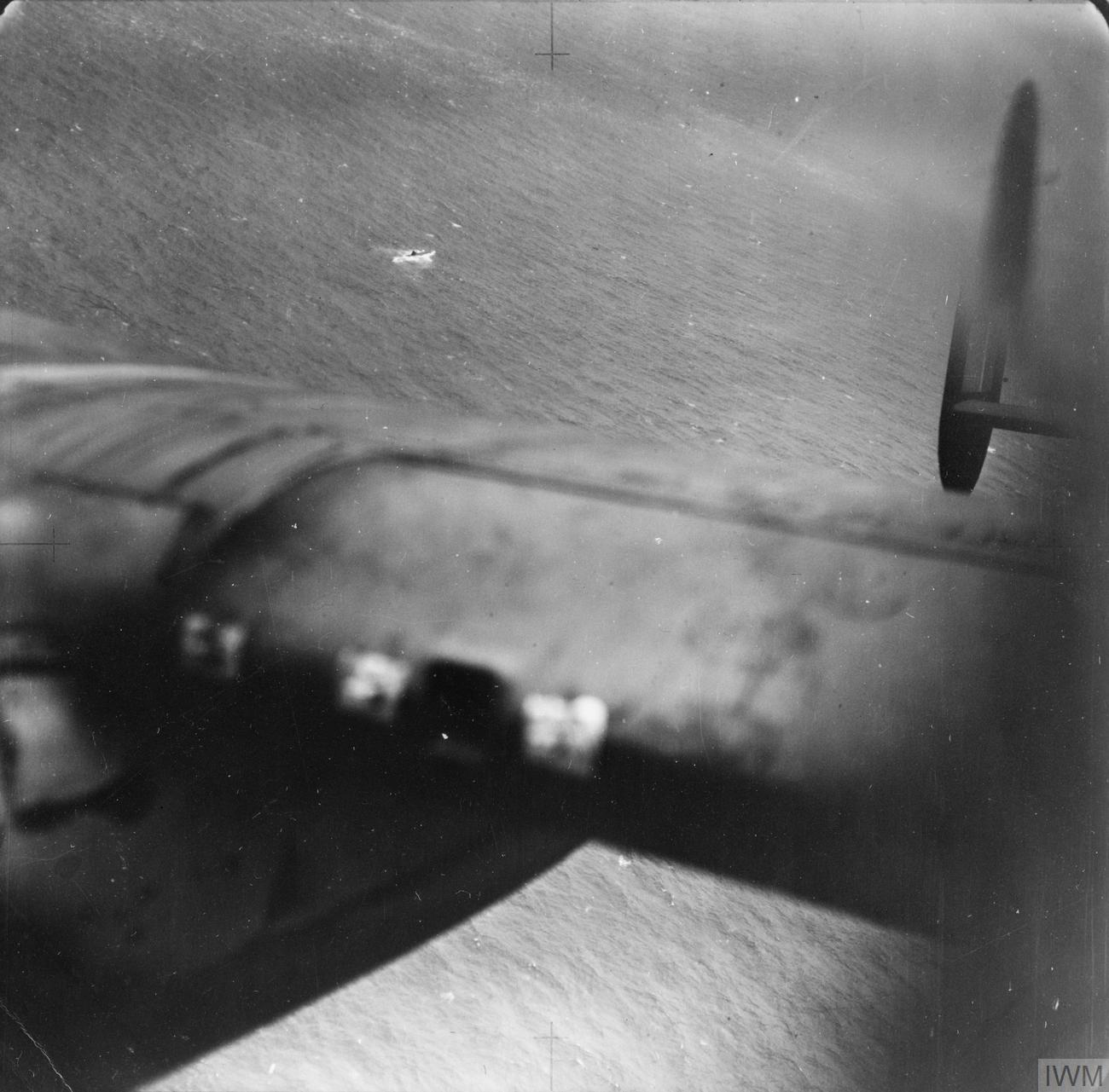 View over the starboard wing of a Lancaster of No. 61 Squadron after the attack on U 751 in the Bay of Biscay