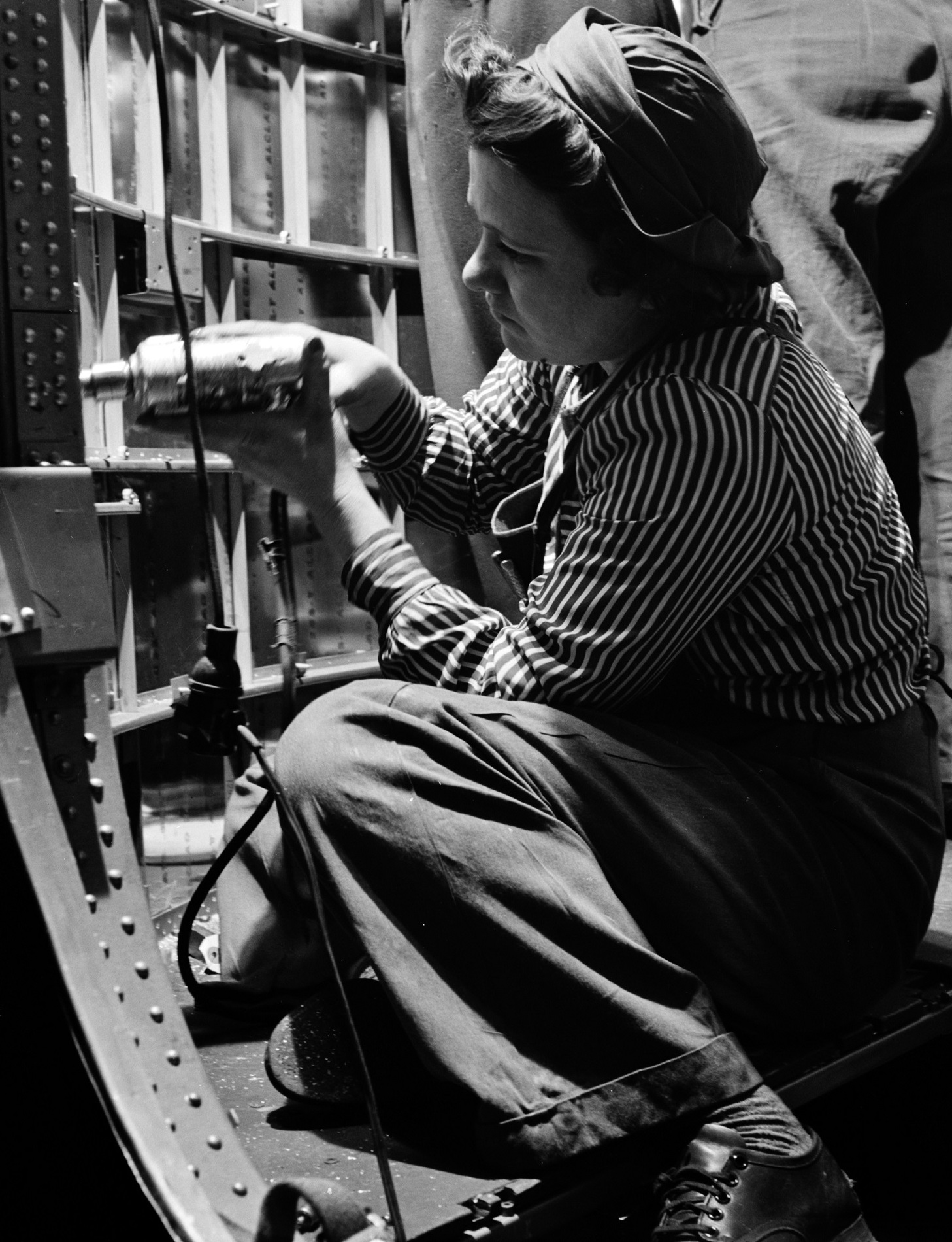 We Can Do It- Women riveters (1942) (cropped)