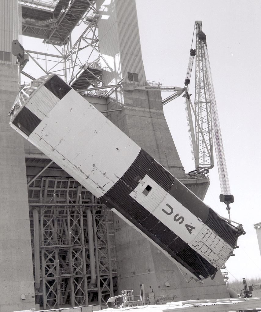 Saturn V first stage lowered to the ground after a static test firing at Marshall