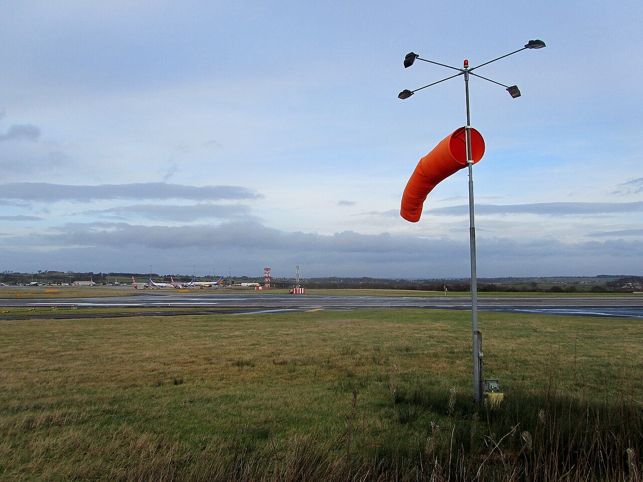 Airport windsock extended by the wind.