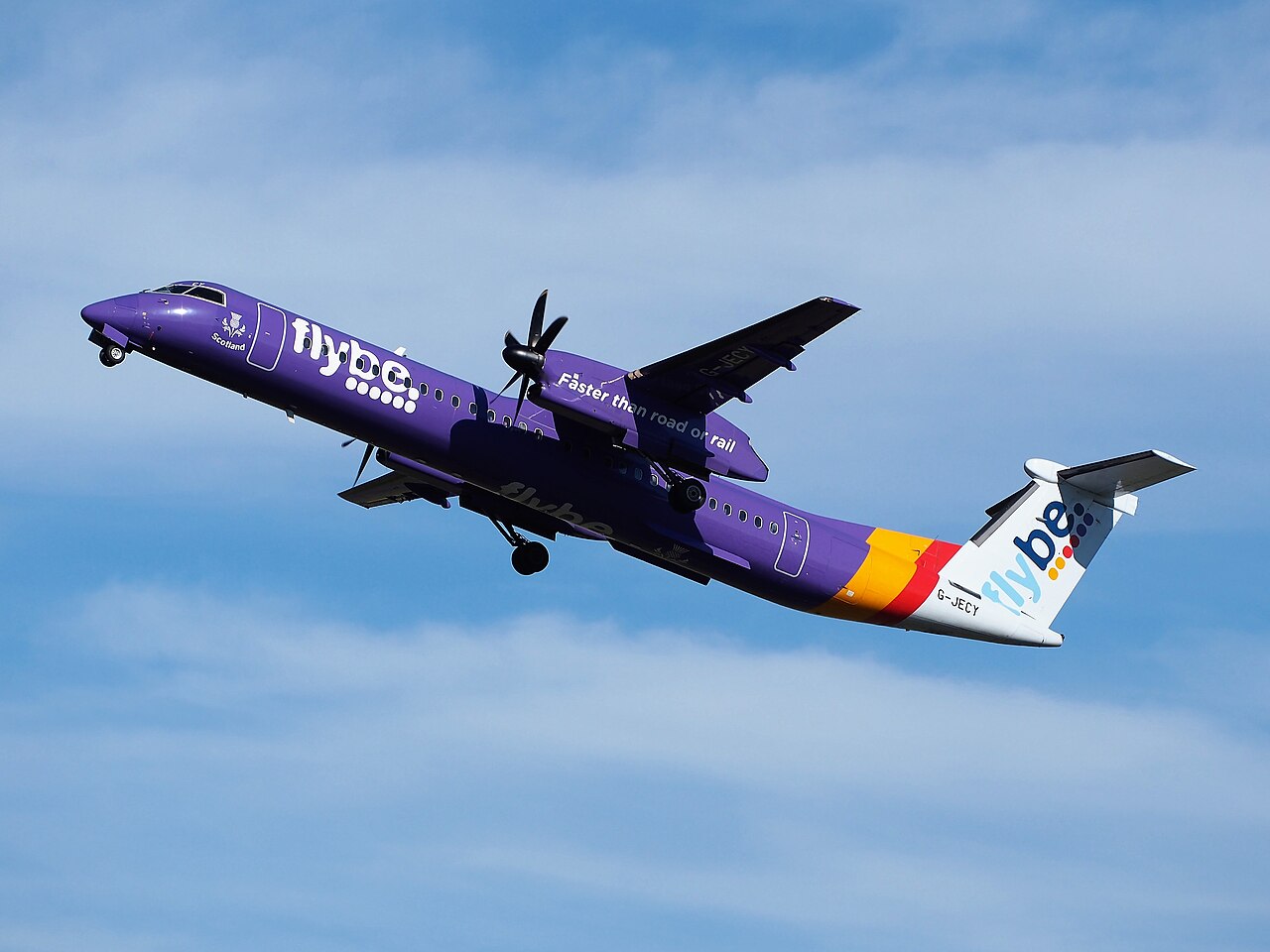 Flybe De Havilland Canada Dash 8 Q400 turboprop taking off from Amsterdam Schiphol.