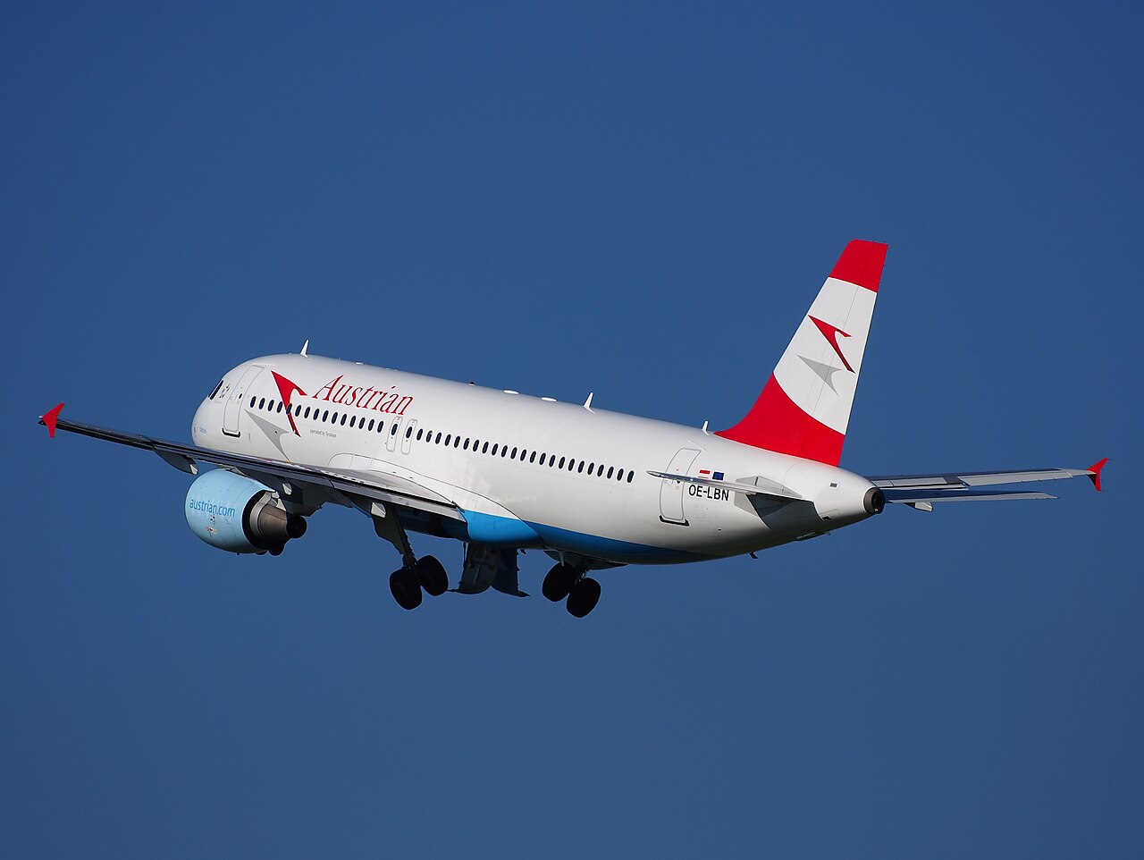 Austrian Airlines Airbus A320 taking off from Amsterdam Schiphol Airport.