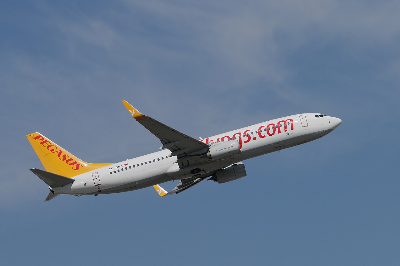 Pegasus Airlines Boeing 737-800 taking off from the runway at Munich Airport.