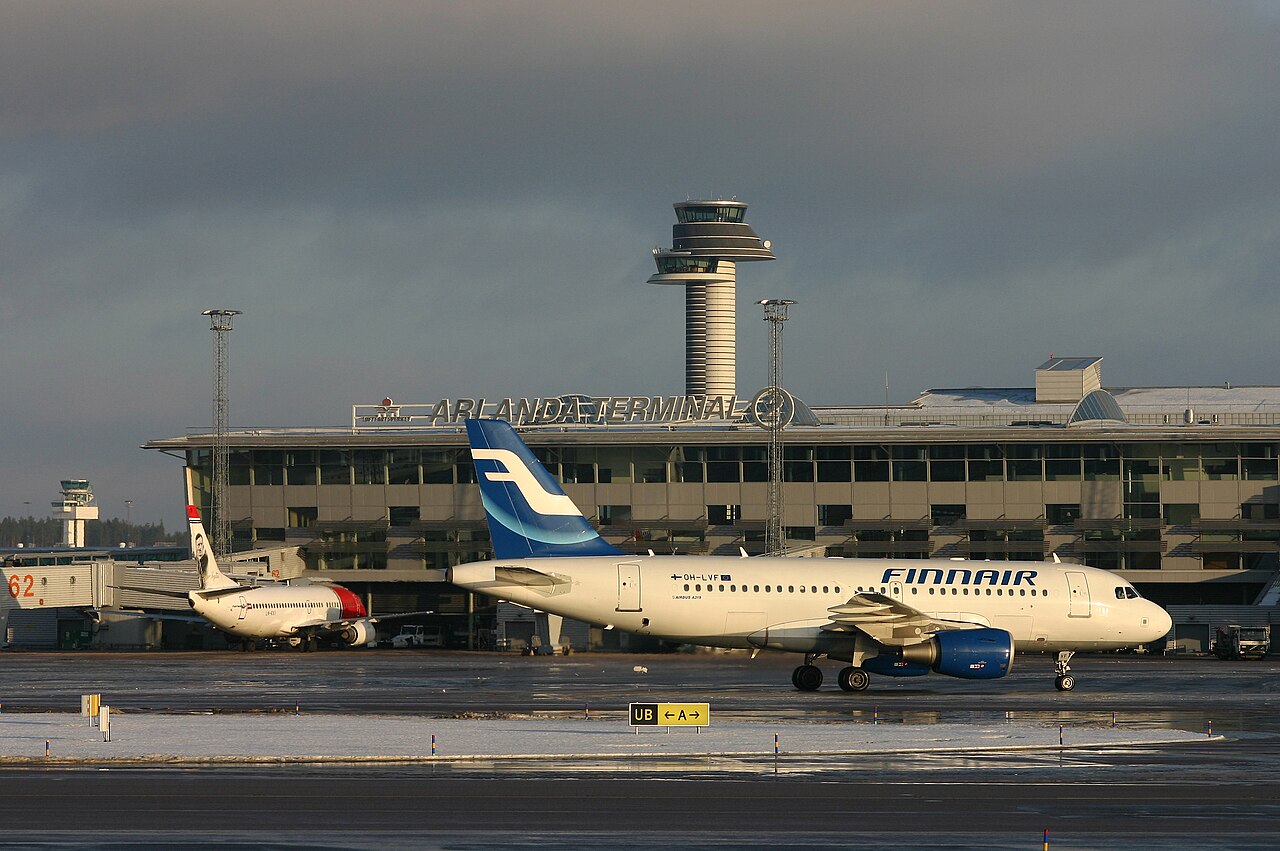 Terminal 2 of Stockholm Arlanda Airport with the control tower in the background.