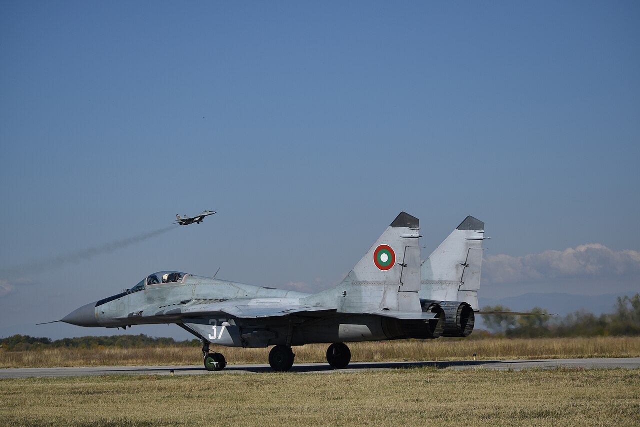 Two MiG-29 fighters in flight during a military open day.