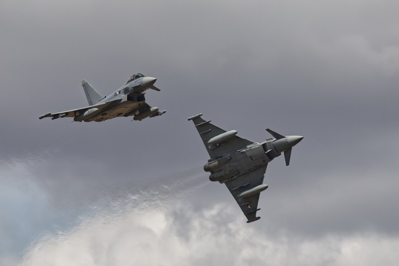 A Eurofighter Typhoon fighter in flight during an air show.