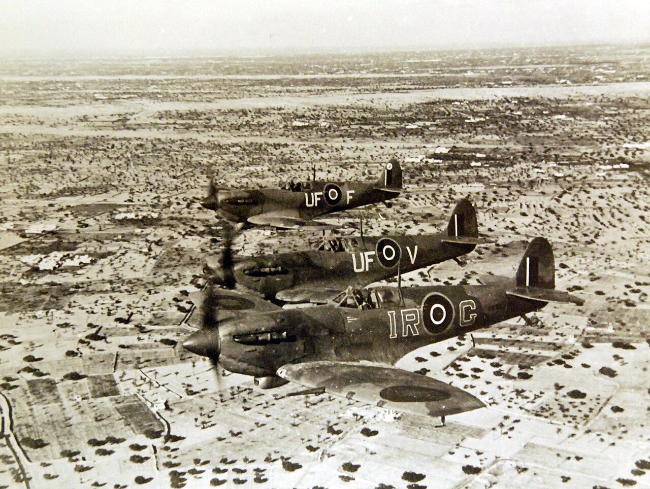 A formation of Spitfire fighters on patrol during the Second World War.