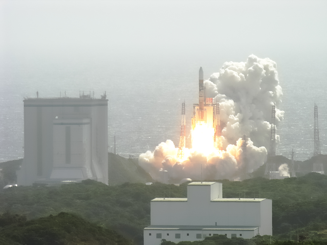 A Japanese H-IIA rocket lifts off carrying the lunar orbiter Kaguya.