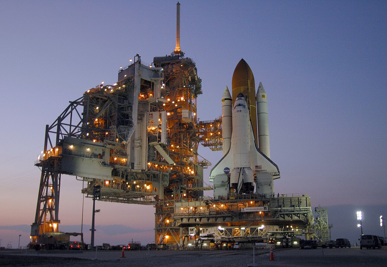 Space Shuttle Discovery stands on Launch Pad 39B at Kennedy Space Center.