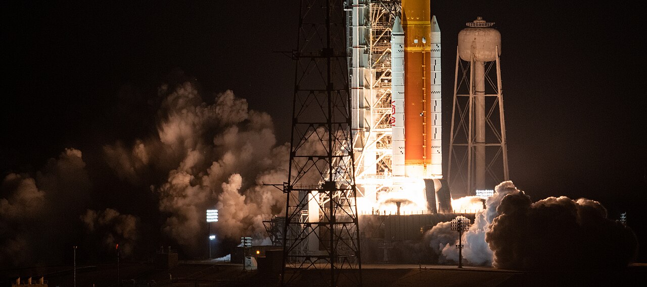 NASA's SLS rocket lifts off at night carrying the Orion spacecraft on the Artemis I mission.